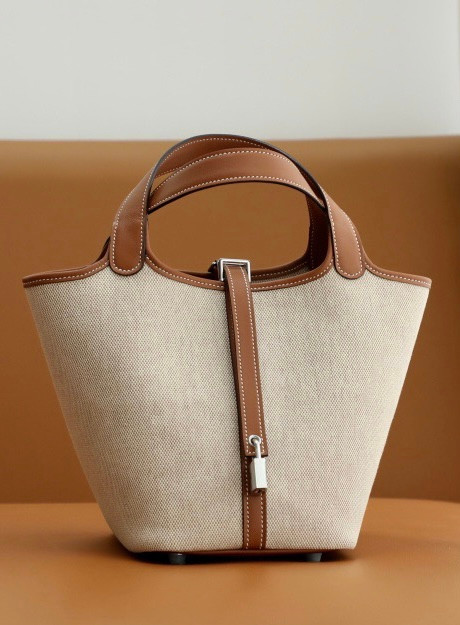 HERMES Toile Swift Picotin 18 PM Gold