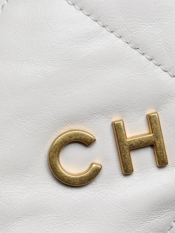 CHANEL 22 MINI HANDBAG GOLD LOGO SS2023 WHITE
