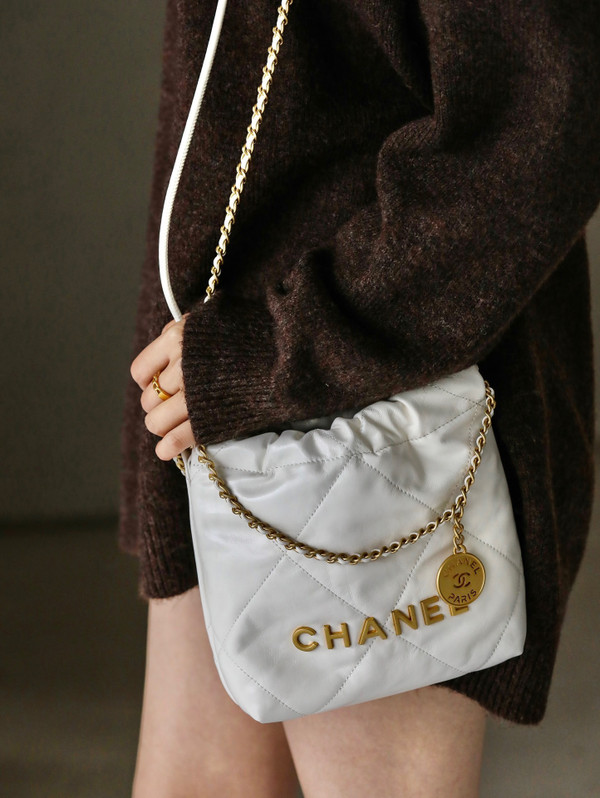 CHANEL 22 MINI HANDBAG GOLD LOGO SS2023 WHITE