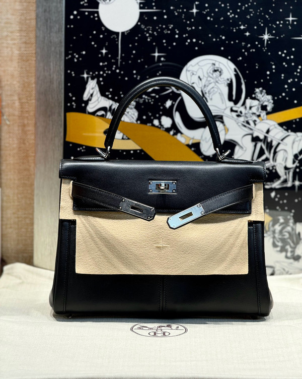 Hermes LIMITED EDITION BLACK SWIFT LEATHER LAKIS KELLY 28 WITH Palladium HARDWARE