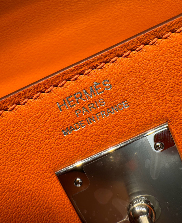 Hermes LIMITED EDITION ORANGE SWIFT LEATHER LAKIS KELLY 28 WITH Palladium HARDWARE