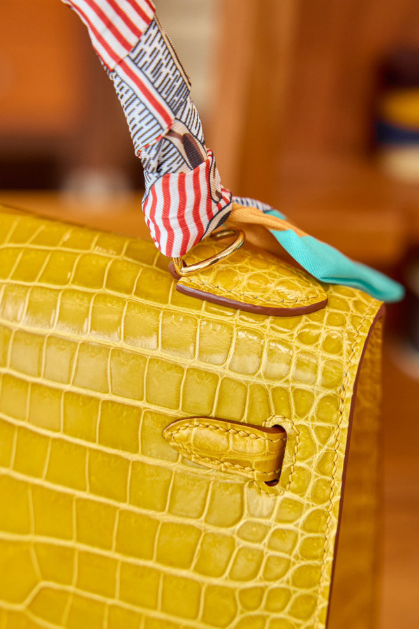 Hermes SHINY JAUNE AMBER NILOTICUS CROCODILE KELLY 25 WITH GOLD HARDWARE