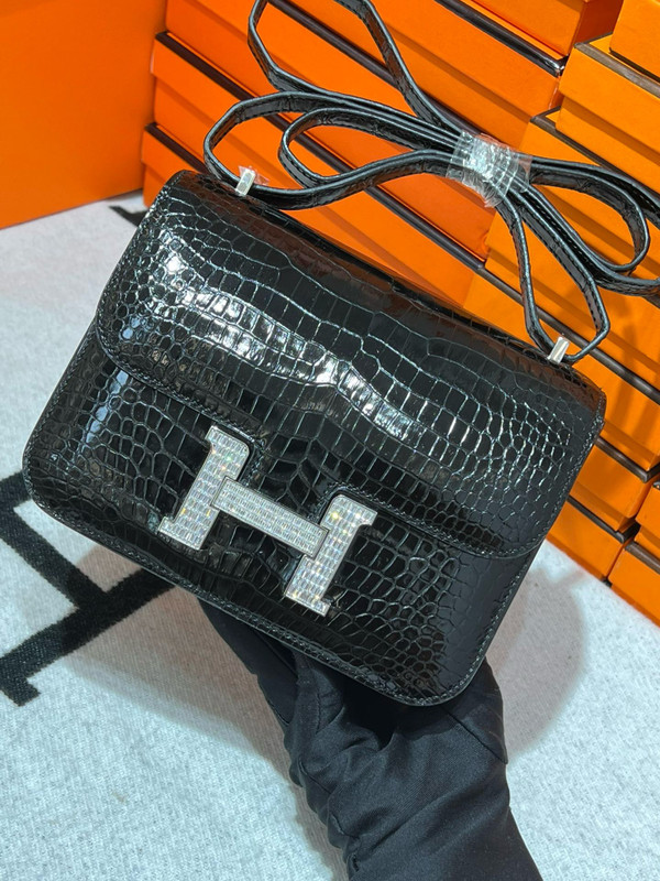 HERMES SHINY BLACK POROSUS CROCODILE MINI CONSTANCE 18 WITH 18K WHITE GOLD & DIAMOND HARDWARE