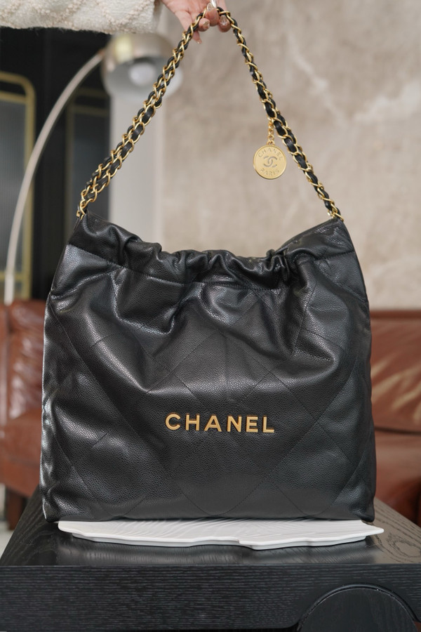 CHANEL 22 HANDBAG Caviar Black with Gold Hardware Medium SS 2024