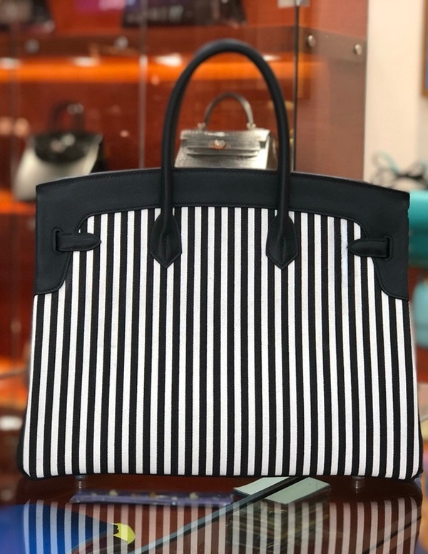 HERMES A LIMITED EDITION BLACK SWIFT LEATHER & TOILE RIGA BIRKIN 35 WITH PALLADIUM HARWARE