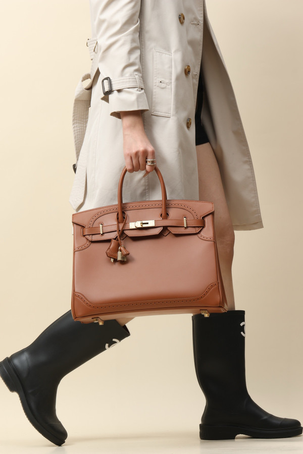Hermes Birkin Ghillies 35 cm handbag in Gold Tadelakt Leather