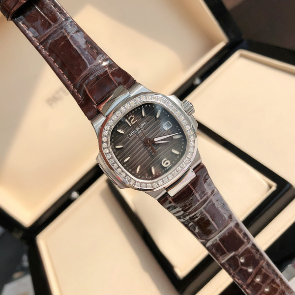 Patek Philippe Nautilus 7010R Ladies Quartz Watch Silver Grey Diamond Bezel