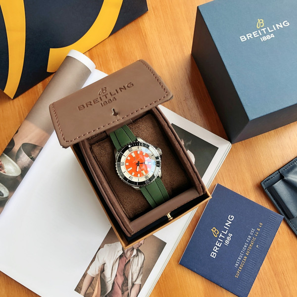 Breitling Superocean 44mm Automatic Diver Watch – Orange Dial, Green Rubber Strap