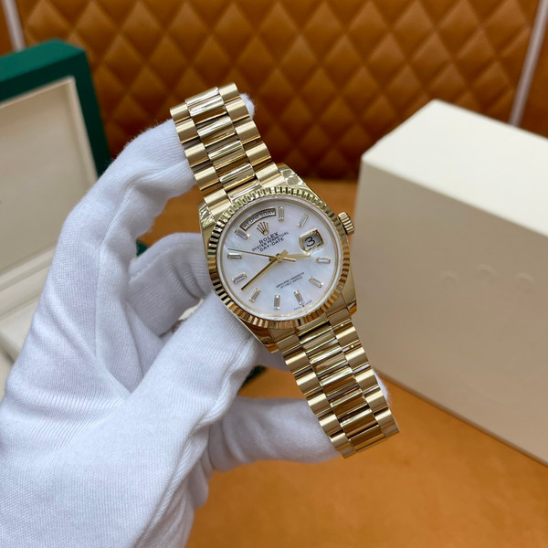 ROLEX DAY-DATE 36 18k Yellow Gold | White Mother-of-Pearl Baguette Dial | President Bracelet