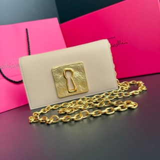 Schiaparelli Double-Eye Clutch Gold