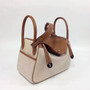 Hermès Lindy 30 Toile/Natural Swift leather with Plladium Hardware