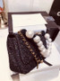 Chanel Pearl flap bag in black tweed