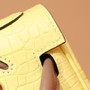 Hermes Kelly Idole (Kelly Doll) in C9 Soupre Yellow Porosus Crocodile with palladium hardware. Hermes Kelly Idole (Kelly Doll) in C9 Soupre Yellow Porosus Crocodile with palladium hardware.