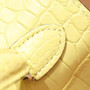 Hermes Kelly Idole (Kelly Doll) in C9 Soupre Yellow Porosus Crocodile with palladium hardware. Hermes Kelly Idole (Kelly Doll) in C9 Soupre Yellow Porosus Crocodile with palladium hardware.