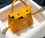 Hermes Quelle Idole Kelly Doll Bag 9V Jaune d'or Swift Palladium Hardware