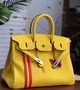 HERMÈS  LIMITED EDITION OFFICIER BIRKIN 35 SOLEIL TOGO HANDBAG