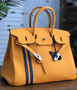 HERMÈS  LIMITED EDITION OFFICIER BIRKIN 35 JAUNE D’OR TOGO HANDBAG