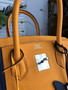 HERMÈS  LIMITED EDITION OFFICIER BIRKIN 35 JAUNE D’OR TOGO HANDBAG