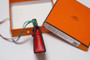 Hermes Tadelakt Mini Kelly Twilly Bag Charm Red with Palladium Hardware