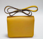 Hermes Jaune d'or Constance Epsom leather 18cm With Enamel Hardware