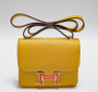 Hermes Jaune d'or Constance Epsom leather 18cm With Enamel Hardware