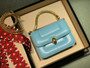 BVLGARI SPECIAL EDITION MARY KATRANTZOU X BVLGARI TOP HANDLE TOPEZ BLUE