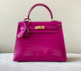Hermes SHINY ROSE SHEHERAZADE NILOTICUS CROCODILE KELLY 25 WITH GOLD HARDWARE Hermes SHINY ROSE SHEHERAZADE NILOTICUS CROCODILE KELLY 25 WITH GOLD HARDWARE