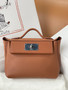 Hermès Mini 24/24 – 21 Bag Gold Evercolor/Swift leather Palladium Hardware