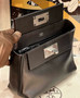 Hermès Mini 24/24 – 21 Bag Black Volupto leather 