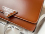  Prada Emblème brushed-leather bag Tabacco