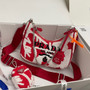 Prada Re-Edition 2006 embroidered drill shoulder bag Red