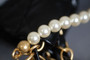 CHANEL 22 MINI HANDBAG GOLD LOGO BLACK SS2023 BLACK WITH PEARL
