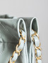 CHANEL 22 SMALL HANDBAG LIGHT BLUE GOLD LOGO