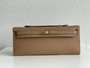 Hermes Kelly 31cm Cut Pochette gold Swift 