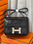 HERMES SHINY BLACK POROSUS CROCODILE MINI CONSTANCE 18 WITH GOLD & DIAMOND HARDWARE