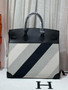 HERMÈS Limited Edition Haut à Courroies 40 HAC handbag in Black and White Evercolor leather and Toile H Canvas with Palladium hardware