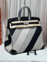 HERMÈS Limited Edition Haut à Courroies 40 HAC handbag in Black and White Evercolor leather and Toile H Canvas with Palladium hardware