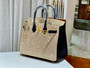 HERMÈS 25CM BIRKIN CUSTOMIZED SWAROVSKI CRYSTAL GOLD HARDWARE WITH GOLD AND BLACK SWIFT LEATHER HERMÈS 25CM BIRKIN CUSTOMIZED SWAROVSKI CRYSTAL GOLD HARDWARE WITH GOLD AND BLACK SWIFT LEATHER