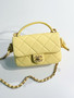 Chanel CRUISE 2024/25 YELLOW FLAP BAG WITH TOP HANDLE  Lambskin & Gold Metal