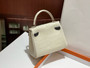 Hermes Kelly Idole (Kelly Doll) in Craie Nilo crocodile with Palladium hardware.