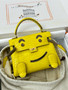 Hermes Kelly Idole (Kelly Doll) in Mimosa Yellow Aligator with Palladium hardware.