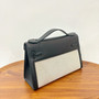 Hermès Limited Edition Mini Kelly Pochette Black Swift leather/ Toile  Gold hardware