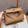 Hermès Biscuit Mini Kelly Pochette Swift leather Palladium hardware