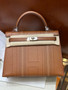 HERMÈS KELLY 25 SAN FRANCISCO GOLD JONATHAN LEATHER PALLADIUM HARDWARE