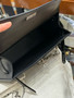 HERMÈS Kelly Pochette Rock 22cm in Black Swift Leather 