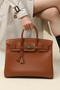 Hermes Birkin Ghillies 35 cm handbag in Gold Tadelakt Leather