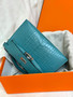 Hermès Kelly Pochette: Bleu Paon Shiny Mississippiensis Alligator