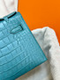 Hermès Kelly Pochette: Bleu Paon Shiny Mississippiensis Alligator