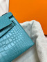 Hermès Kelly Pochette: Bleu Paon Shiny Mississippiensis Alligator