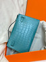 Hermès Kelly Pochette: Bleu Paon Shiny Mississippiensis Alligator